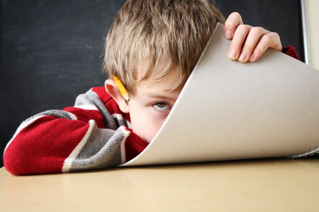 ADHD and Sleep Problems: How Are They Related? student trying to focus at school