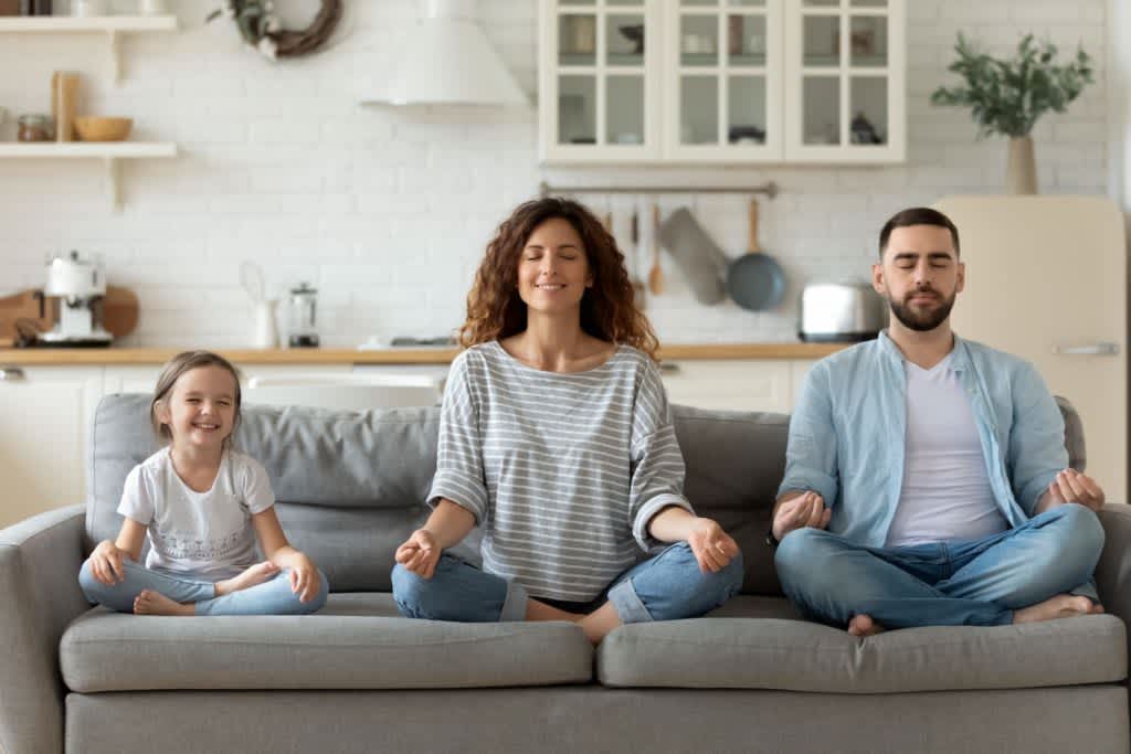 Can’t Sleep? 8 Techniques You Can Do family meditating on a couch