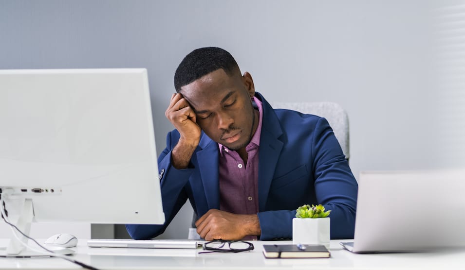 Narcolepsy Treatment man falling asleep at his desk